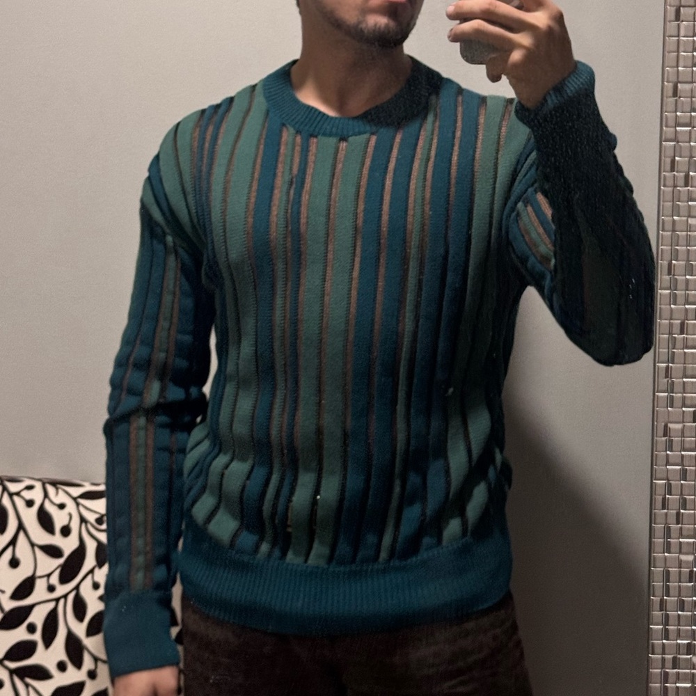 Crew neck sheer sweater limited edition.